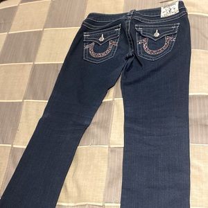 True Religion Blue Jeans w/back pocket stone design, boot cut style in size 29.